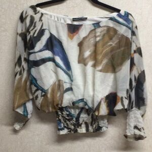 This adorable top is a Madison Paige